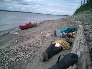 In the beginning of the journey, the travelers used their  15-minute breaks for short naps, but later  in the trip spent the  time collecting rocks instead. Photo courtesy Don Hornbeck