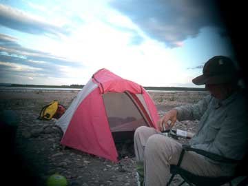 Phil Bauer relaxes at one of the many campsites they had to set up daily. Photo courtesy Don Hornbeck