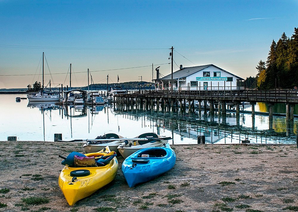 (Photo: Ed Johnson, award-winning photographer) KP News Ed Johnson’s photograph of kayaks at Lakebay Marina won second place in Harbor WildWatch’s Beauty and the Beaches photo contest last month. All of the entries are on exhibit at the Skansie House in Gig Harbor. NIKON D300S, 28mm, f/5.6, ISO 200