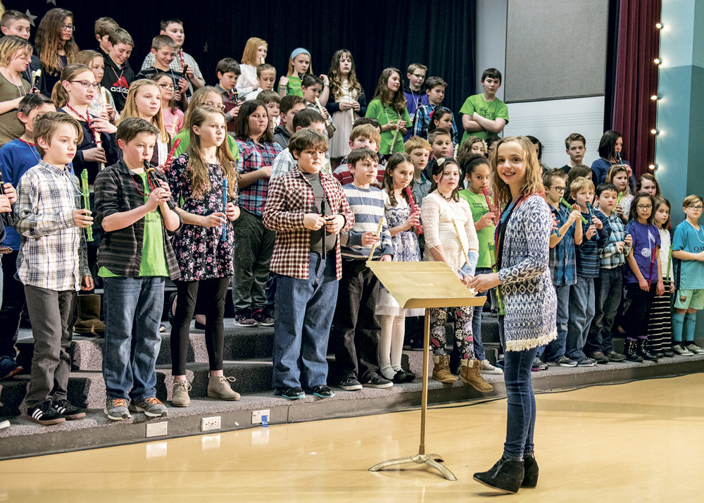 Woodwind maestro Maris Johnson leads the recorder section during a Vaughn Elementary School musical showcase March 9. Photo: Ed Johnson, KP News