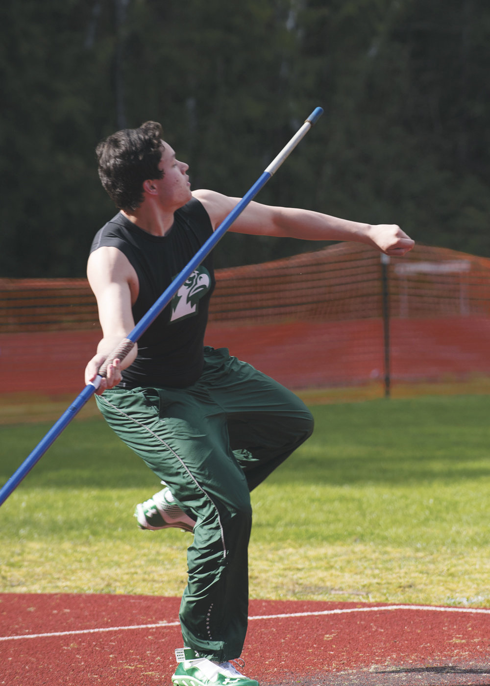 Peninsula High School freshman and KP resident Mason Hyde, 15, throws the javelin 130 feet 1 inch, for a personal best and second place during the track meet at Gig Harbor High April 6. Hyde ranks No. 10 in the South Sound league. Photo: Ed Johnson, KP News