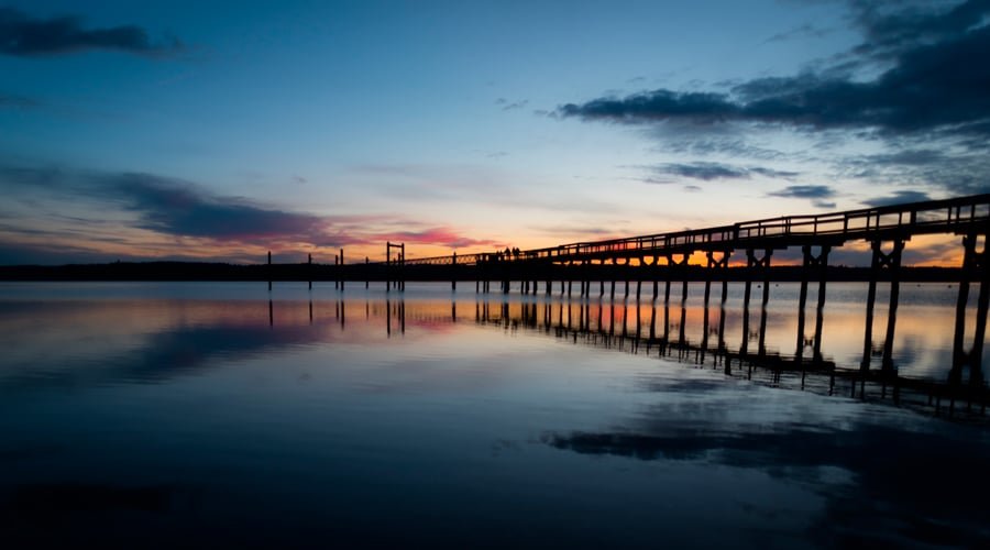 Joemma State Park pier silhouetted at sunset. Photo: Richard Miller, KP News