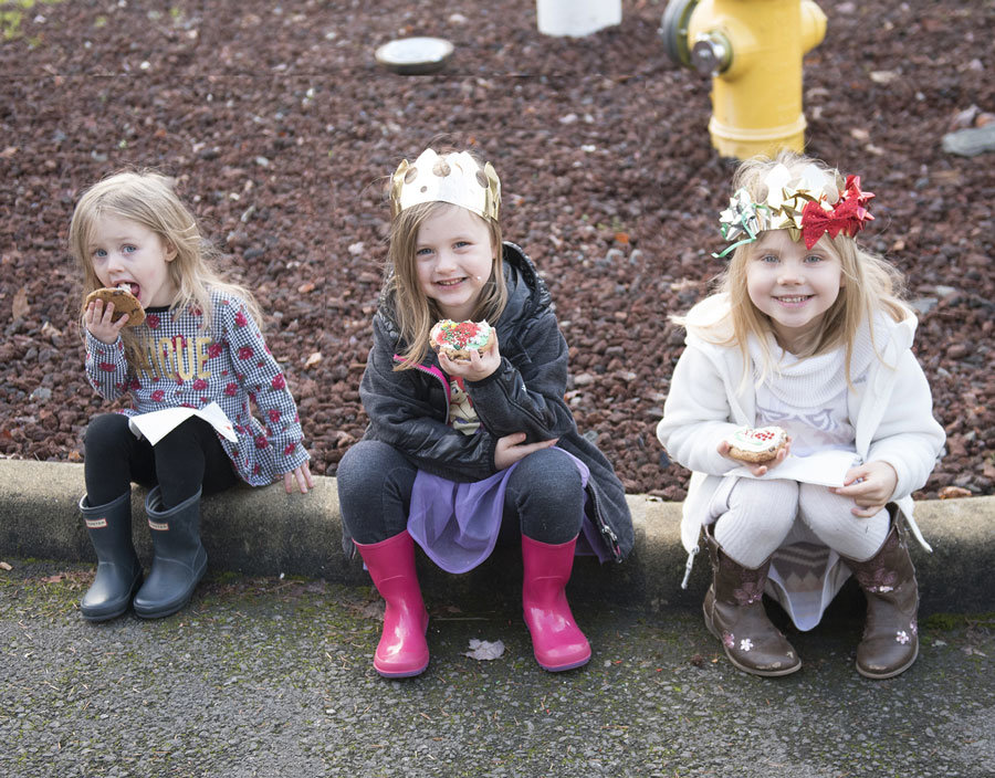 Paisley Phillips, Addison Phillips and Grace Maynard enjoying the fruits of their labors decorating cookies. Photo: Ed Johnson, KP News