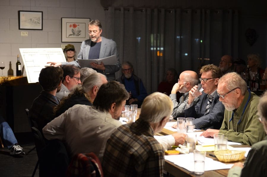Local actor Jonathan Bill, goes over details in the murder trial in the play “12 Angry Men.” The reading was directed by David Starkweather for a private event at Blend. Photo: Lisa Bryan, KP News