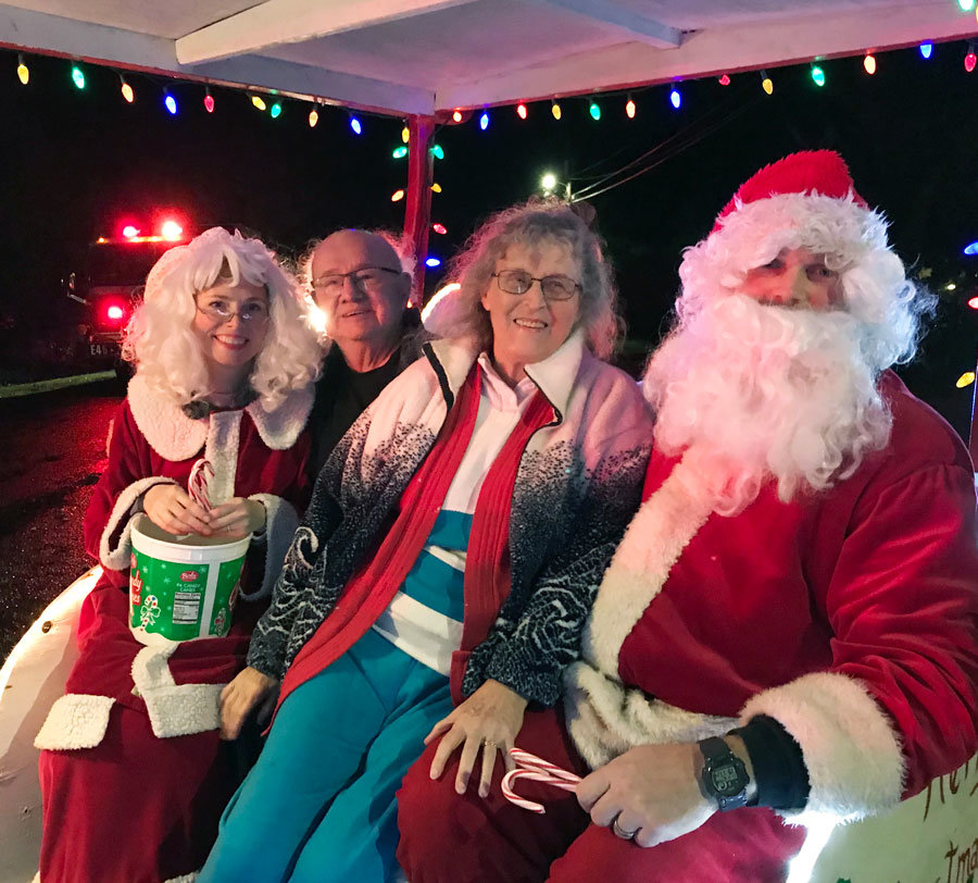 Sleigh flies full circle Dec. 16 as triple-decade veterans Santa and Mrs. Claus, a.k.a. Fred and Mary Ramsdell, now of Bainbridge Island, return for a victory lap with two new secret celebrity white-haired newbies. Photo: Anne Nesbit