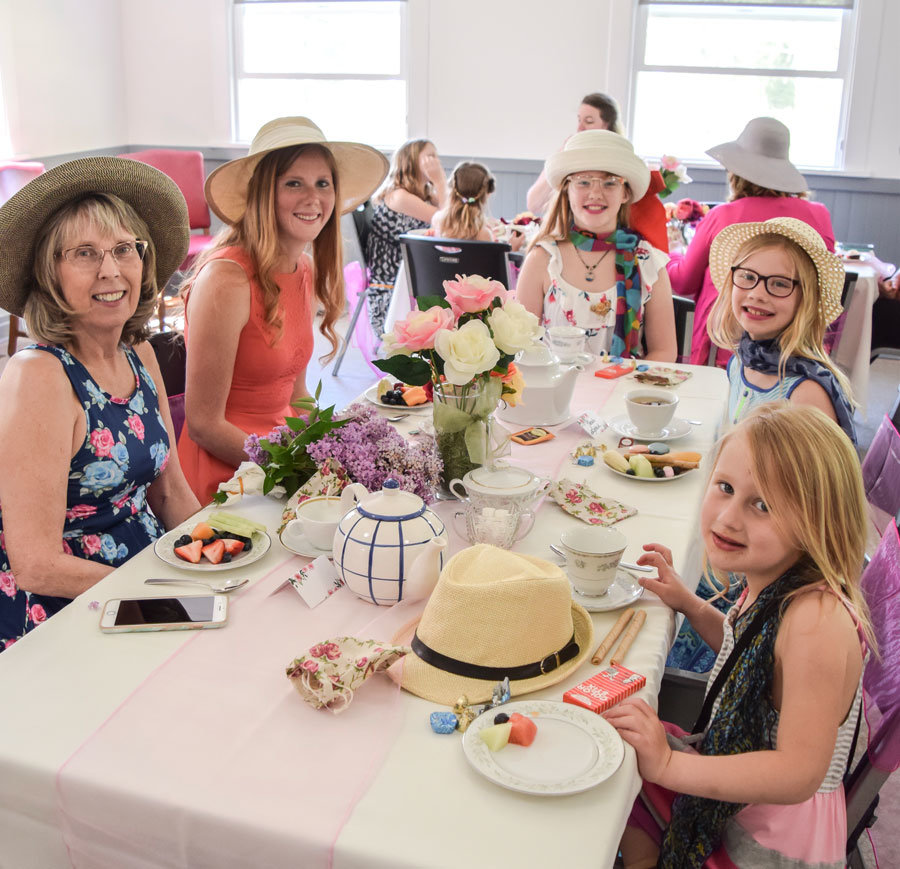 Kate Goodrich, Mommy Hailey Lystad, and daughters Eva, Nora and Charlotte celebrating traditions at the Mommy and Me Tea hosted by Key Pen Parks. Photo: Veronica Grandt