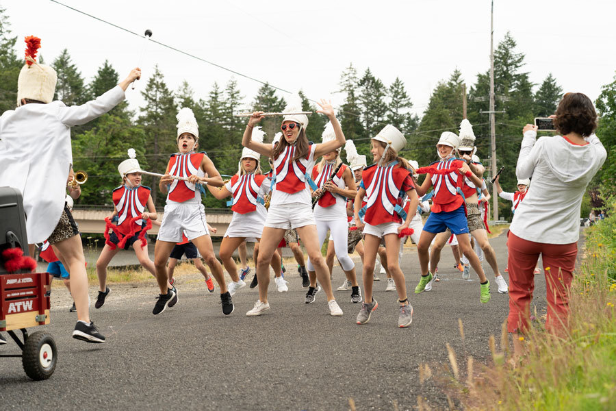The Filucy University Birds marching band sets a tone of hilarity at the Fourth of July parade in Home, with a record turnout of parade floats and parade watchers. Photo: Chris Konieczny, KP News