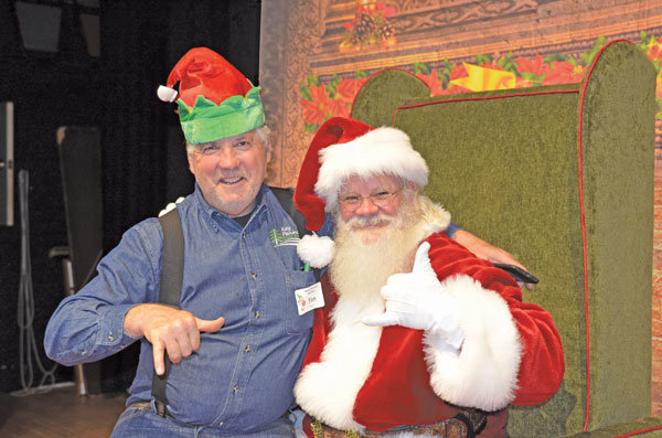 Tim Kezele, KPCCA president on Santa's lap. Photo: Lisa Bryan, KP News
