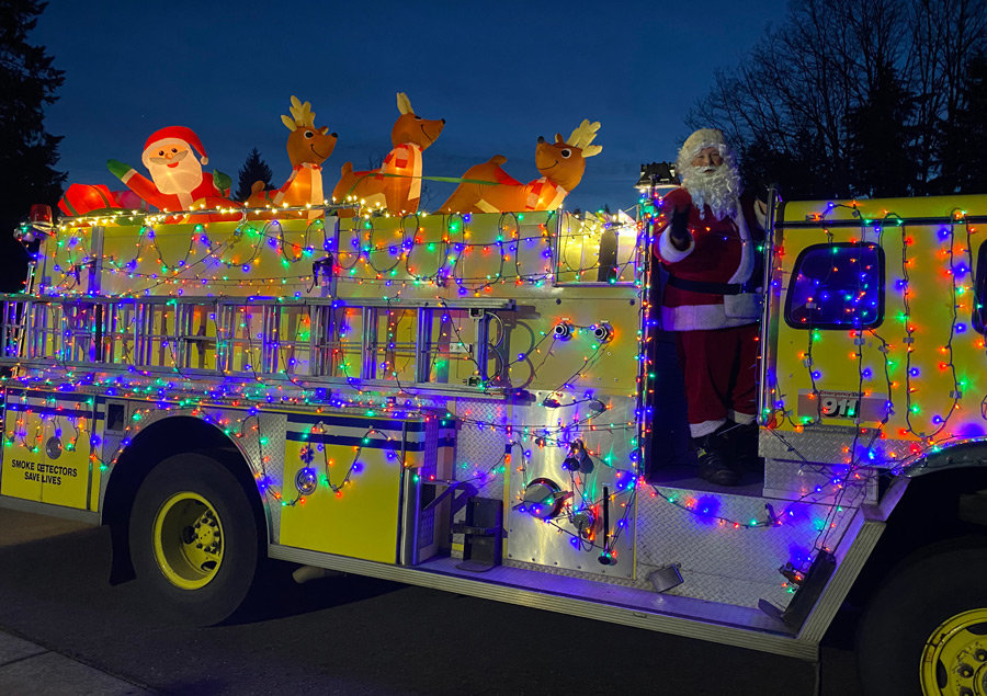 Santa and crew hitched a ride from KP Fire Dept. to tour select KP neighborhoods.