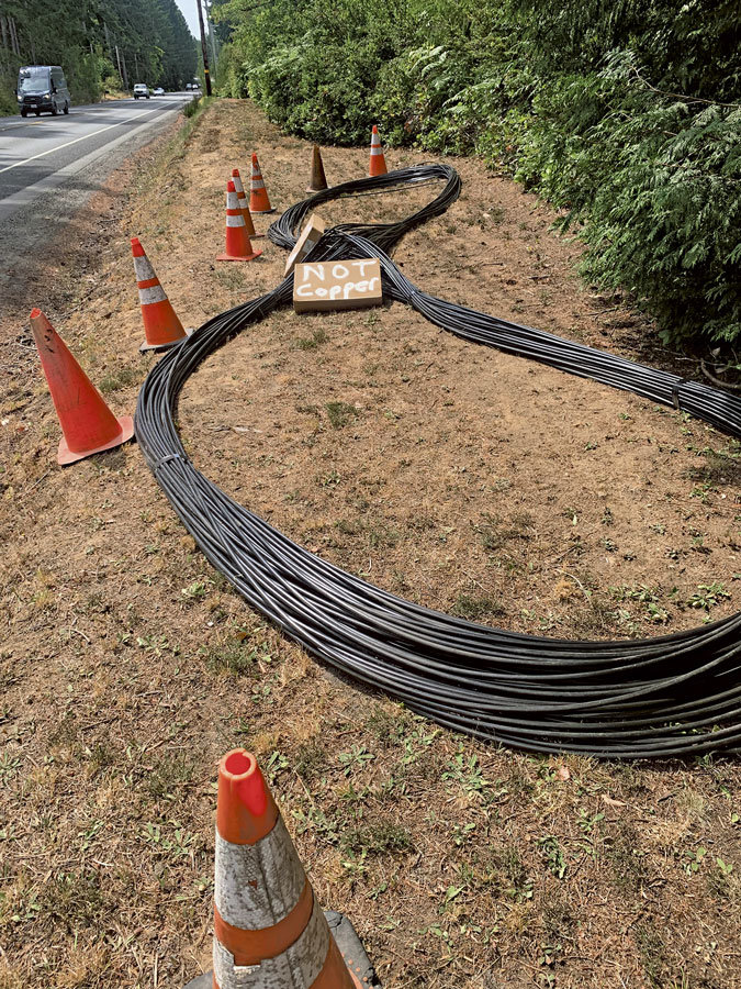 Crews installing Peninsul School District’s new fiber optic cable marked everything “Not Copper” to prevent theft.