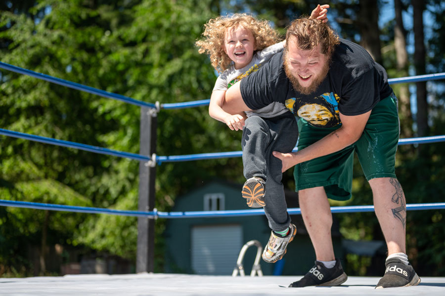 Kasyn Mason is always ready to wrestle his dad in their backyard ring.