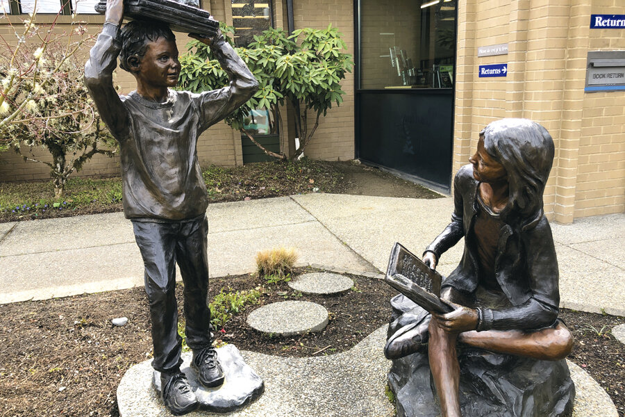John Jewell’s sculpture “Balancing the Books,” was commissioned and paid for by the Friends of the Key Peninsula Library.