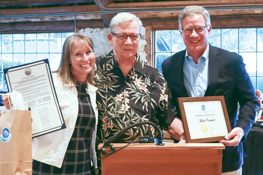 Pierce County 2022 Volunteer Special Achievement Award winner Mark Cockerill of Lakebay, flanked by Councilmember Robyn Denson (7-Gig Harbor) and County Executive Bruce Dammeier at the Pierce County Council meeting held at the Longbranch Improvement Club May 18.