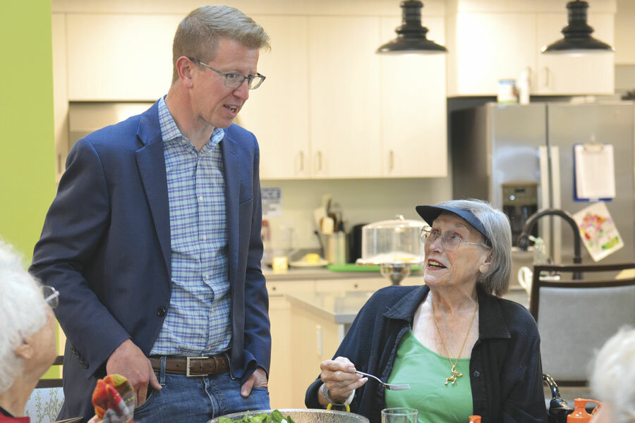 Rep. Derek Kilmer visits residents of The Village at The Mustard Seed Project, for which he helped find funding.